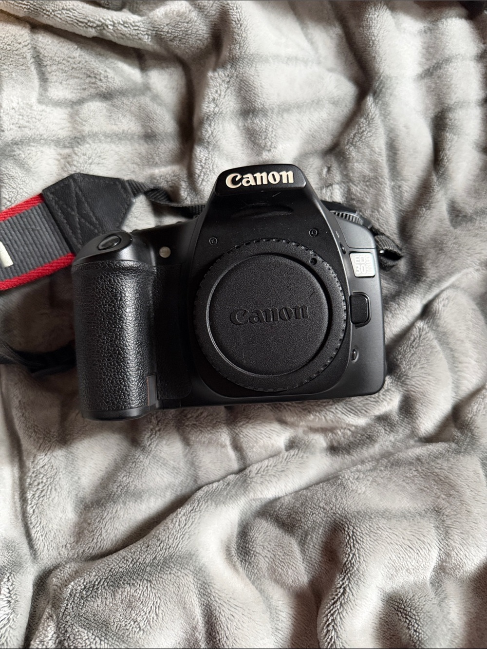 Canon Black DSLR Camera Body with Red-Trim Strap